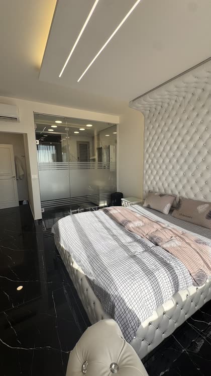 Phone photograph of the master bedroom